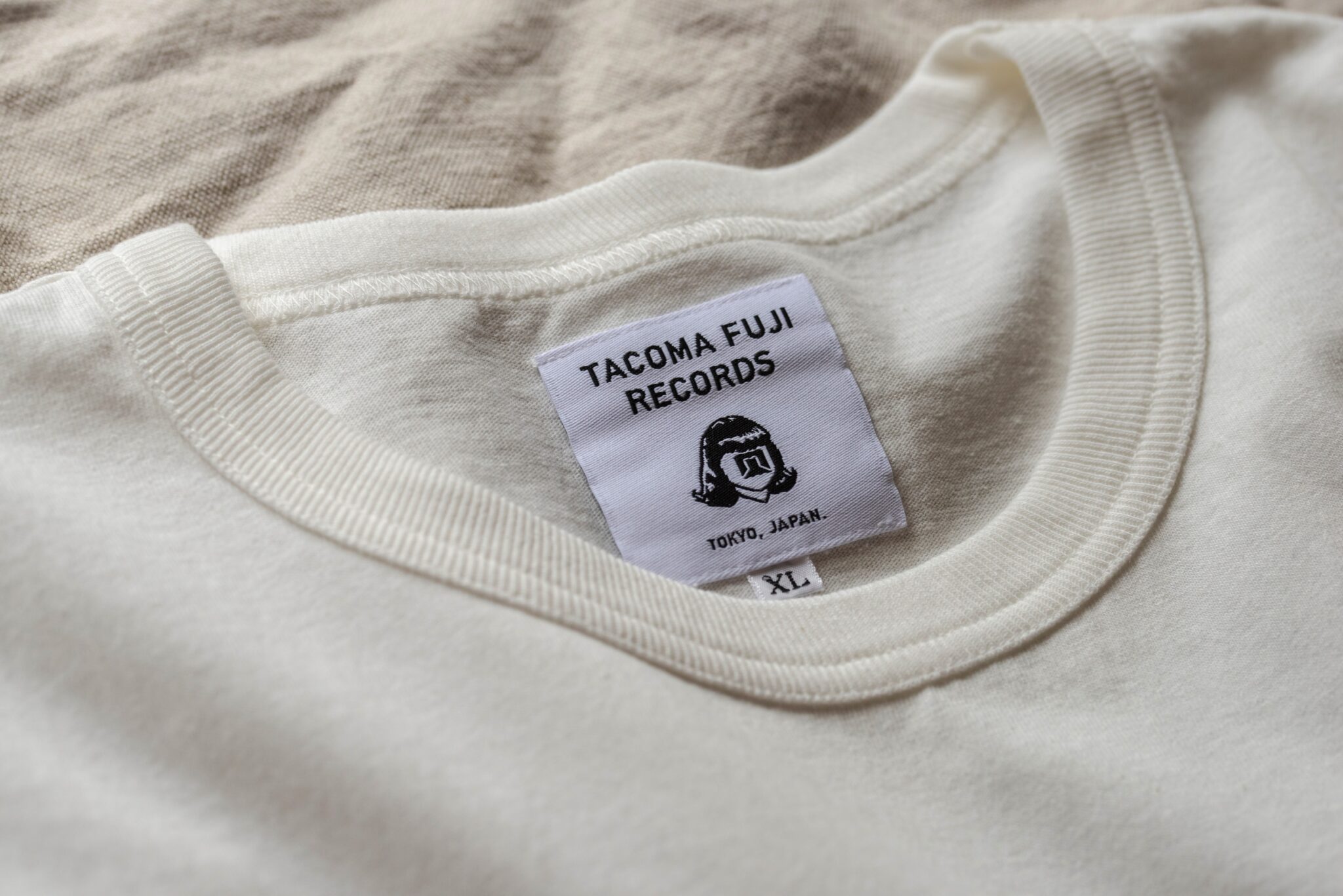 Photo: brand name tag of TACOMA FUJI RECORDS